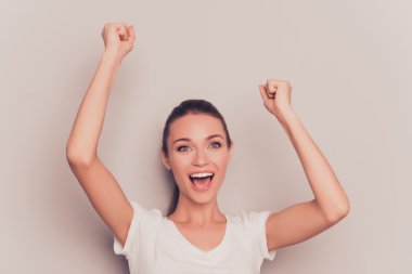 Yes! Cheerful happy woman celebrating her victory clipart