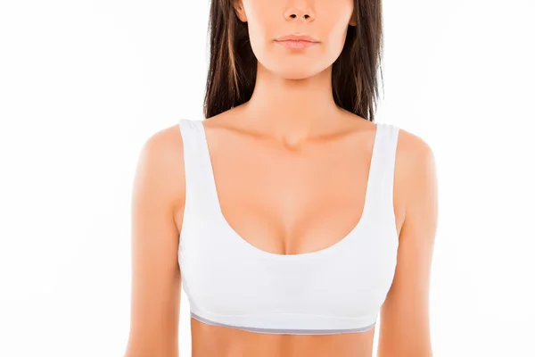 Close up of young perfect shapely woman in white bra — Stock Photo, Image