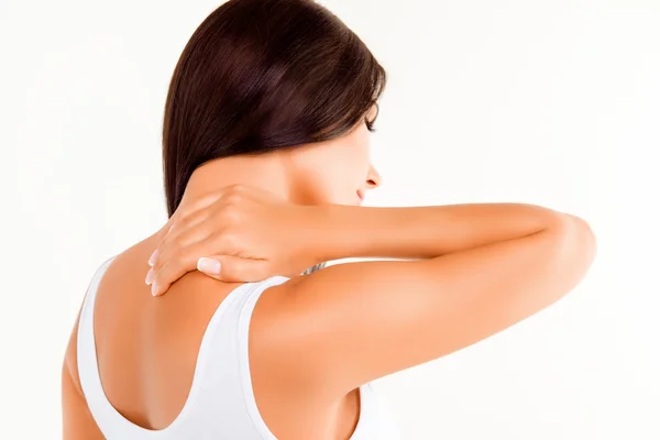 Kobiety z ból w szyi, robi masaż z bliska — Zdjęcie stockowe
