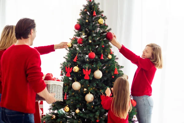Portrait of nice adorable friendly attractive big full cheerful family small little kids decorating tree spending day Eve Noel holly jolly in light white apartment house indoor — Stock Photo, Image