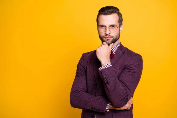 Photo of handsome wealthy clothes stylish guy boyfriend business man well-dressed hand on chin minded smart person wear specs tie bow shirt blazer isolated yellow color background — Stock Photo, Image
