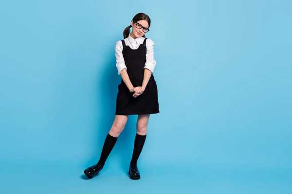 Full length body size view of her she nice attractive lovely pretty cute winsome shy modest cheery schoolgirl posing isolated over bright vivid shine vibrant blue color background — Stock Photo, Image