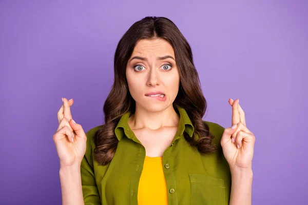 Close-up portrait of her she nice attractive lovely pretty cute worried brown-haired girl waiting news crossed fingers isolated over bright vivid shine vibrant lilac violet purple color background — Stock Photo, Image