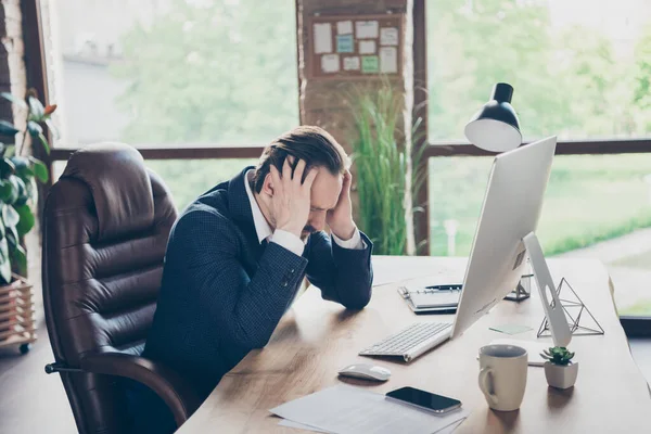 Profile side view portrait of his he handsome devastated frustrated man fired expert economist feeling sorrow staff cost reduction industry modern loft brick industrial open space work place station — Stock Photo, Image