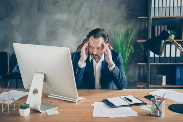 Portrait of his he nice handsome devastated miserable frustrated man feeling bad pain crisis burn out sorrow bankruptcy budget lack at modern industrial concrete wall work place station — Stock Photo, Image