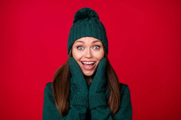 Close-up portrait of her she nice attractive pretty lovely amazed cheerful cheery glad girl wear warm clothes enjoy good news isolated over bright vivid shine vibrant red color background — Stock Photo, Image