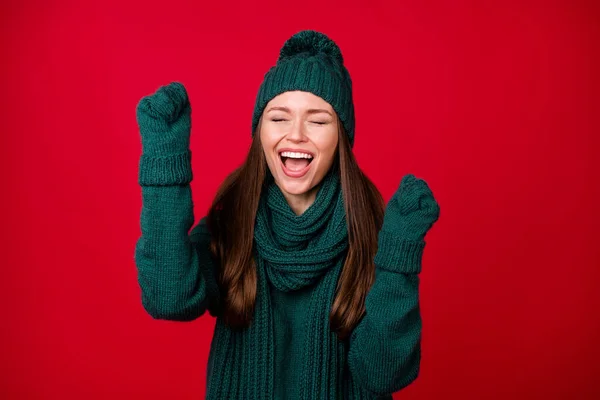 Close-up portrait of her she nice attractive ecstatic dreamy cheerful cheery girl wear wool knit rejoicing celebrating great luck isolated over bright vivid shine vibrant red color background — Stock Photo, Image