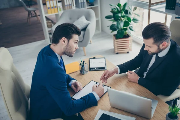 Top above high angle view of two nice attractive handsome classy imposing trendy men discussing finance project signing contract in light white interior work place station indoors — Stock Photo, Image