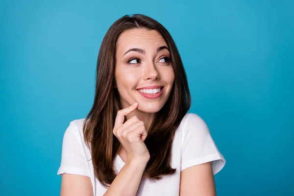 Closeup photo of attractive funny lady good mood charming appearance look side empty space made stupid thing girlish expression wear casual white t-shirt isolated blue color background — Stock Photo, Image