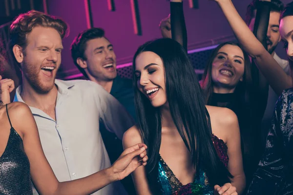 Portrait photo of cheerful girl dancing on dance floor in night club laughing celebrating together xmas on party with friends — Stock Photo, Image
