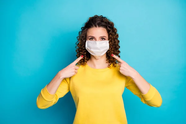 Portrait of her she nice attractive wavy-haired girl wearing demonstrating safe medical mask ncov-2 covid19 decontamination isolated bright vivid shine vibrant blue color background — Stock Photo, Image