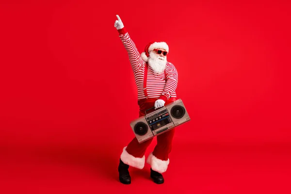 Full length body size view of his he nice handsome bearded fat overweight cheery Santa having fun festive listening stereo dancing isolated bright vivid shine vibrant red color background — Stock Photo, Image