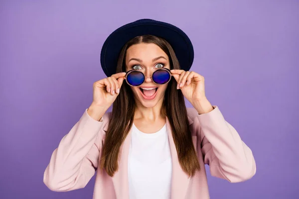 Portrait astonished funky millennial girl have weekend free time holiday look wonderful black friday novelty impressed scream touch specs wear pastel outfit isolated violet color background — Stock Photo, Image