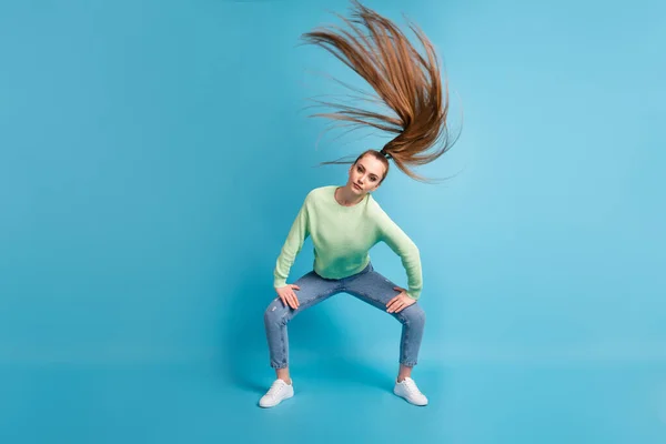 stock image Photo portrait of serious girl twerking waving hair isolated on pastel blue colored background