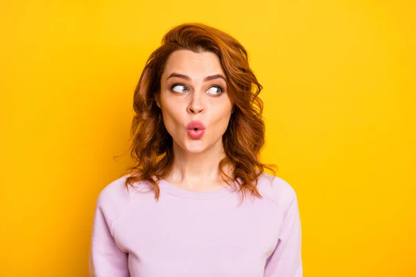 Close up photo of beautiful ginger lady open mouth perfect o shape dont speak looking side empty space listen rumours wear pink sweater shirt isolated yellow color background — стоковое фото