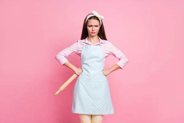 Portrait of frowning aggressive mother wife hold rolling pin put hands waist want start scandal wear stylish trendy clothes isolated pastel color background — Stock Photo, Image