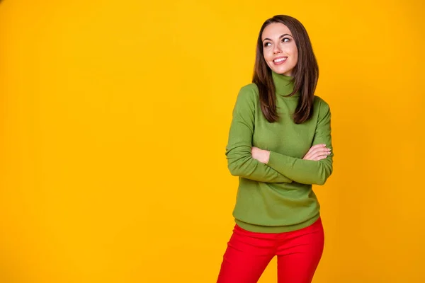 Portrait of pretty cheerful girl folded arms looking aside copy blank space isolated over bright yellow color background — Stock Photo, Image