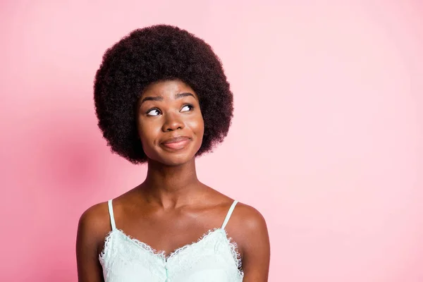 Photo of minded creative pretty girl look empty space dream imagine idea isolated on shine pastel pink color background — Stock Photo, Image