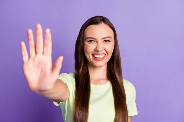 Portrait of optimistic woman arm wave you smile light green outfit isolated on pastel magenta color background — 图库照片