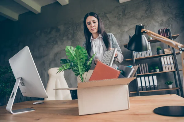 Low angle view photo of frustrated girl put keyboard in cardboard box cry dont want quit job company bankropt corona virus crisis wear blazer jacket in workstation loft — Stock fotografie