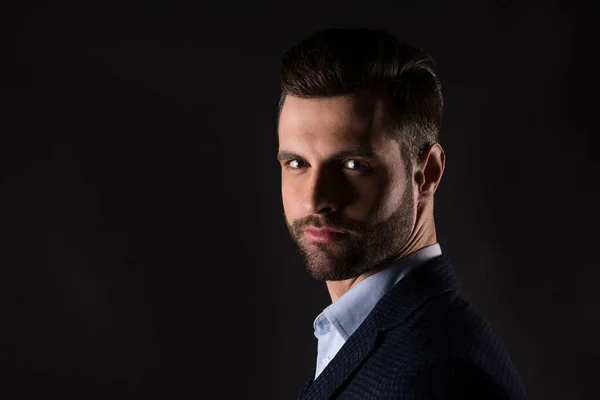 Close-up profile side view portrait of his he nice attractive content rich wealthy well-groomed agent broker guy corporate partner isolated over dark black color background — Stock Photo, Image