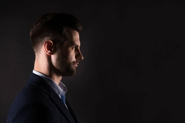 Close-up profile side view portrait of his he nice attractive man professional director corporate partner company owner isolated over dark black pastel color background — Stock Photo, Image