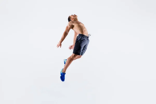 Full length body size view of his he nice attractive sportive devoted professional purposeful guy team player jumping striving isolated over light white pastel color background — Stock Photo, Image
