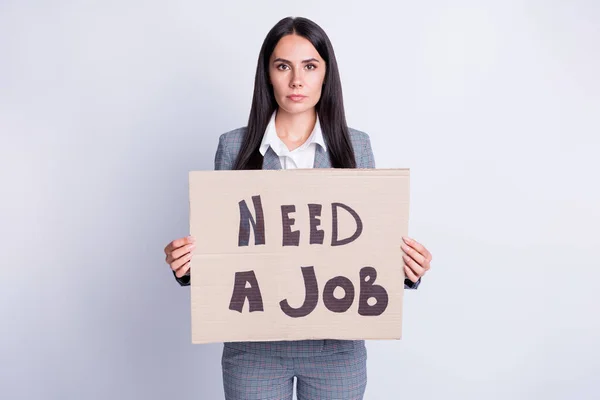 Photo of serious woman collar representative staff dismissal person lose job search showing paper card need work wear checkered plaid pants isolated over grey color background