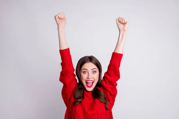 Photo portrait of surprised brunette happy yelling gesturing like winner hands over head isolated on pastel grey color background — Stock Photo, Image