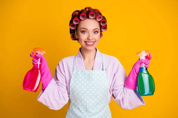 Photo of positive girl wife hold sprayer bottle wear bath robe apron gloves isolated shine color background