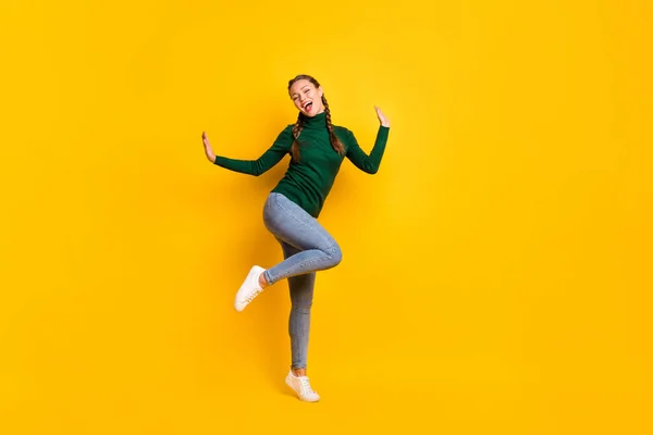 Full length body size photo female student laughing dancing at party isolated on vivid yellow color background — ストック写真