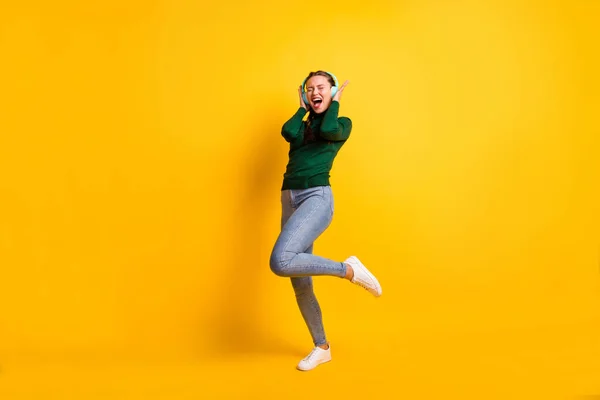 Full length body size photo funky girl listening blue earphones singing loud isolated on bright yellow color background — Stock Photo, Image