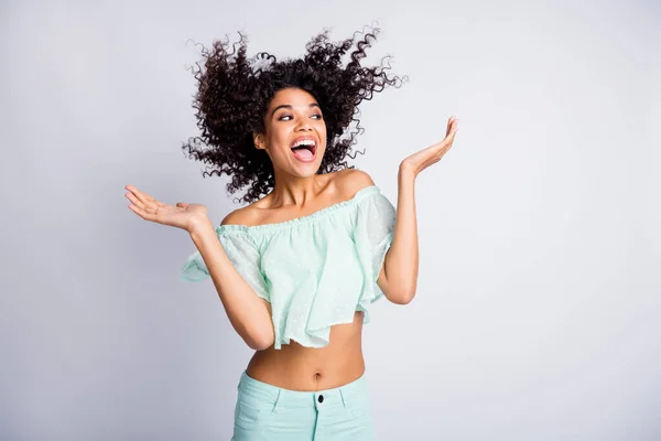 Photo portrait of excited laughing girl with flying hair isolated on white colored background — Stock Photo, Image