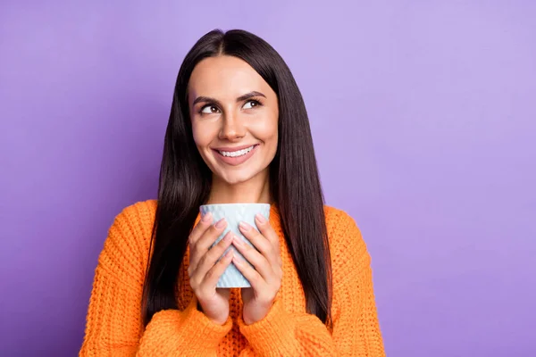 Portrait of charming lady hold drink mug look empty space wear pullover isolate don purple color background — Stok Foto