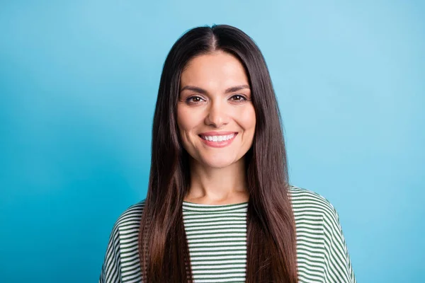 Photo of satisfied person smile look camera wear white green stripes isolated on blue color background