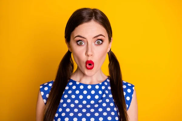 Close-up portrait of her she nice-looking attractive lovely glamorous amazed girl wearing blue dotted blouse pout lips news reaction isolated over bright vivid shine vibrant yellow color background — Stock Photo, Image