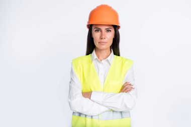 Photo of self-assured worker lady crossed hands wear helmet shirt vest isolated white color background clipart