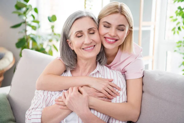 Photo of calm peaceful women family hug enjoy free time weekend good mood love indoors inside house home — Stock Photo, Image