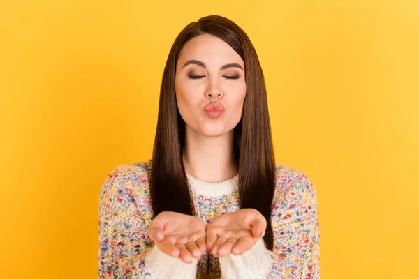 Photo of cute charming lovely young woman send air kiss you hands isolated on yellow color background — 图库照片