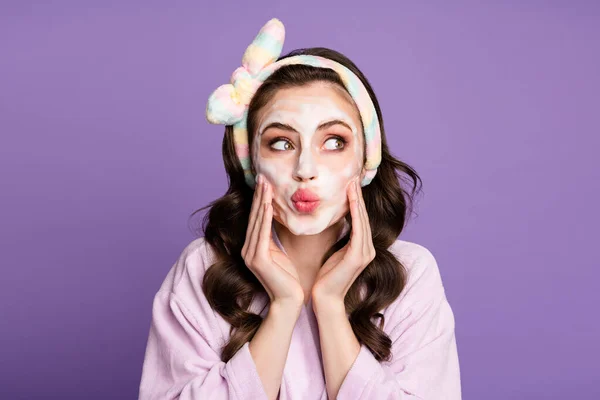 Photo portrait of curious girl applying cleansing foam looking at blank space with pouted lips isolated on bright violet color background — Stock Photo, Image