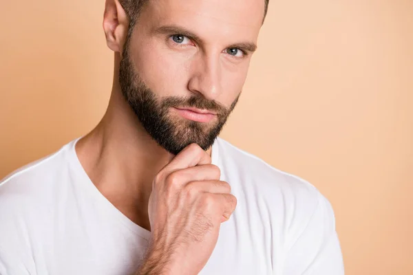 Cropped photo of young handsome stubble man serious think ponder pensive plan hand touch chin isolated over beige color background — Stock Photo, Image