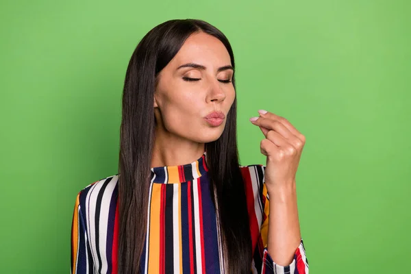 Portrait of attractive dreamy girl pretending good food cuisine taste isolated over green pastel color background — Stock Photo, Image