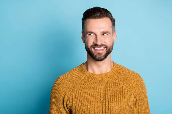 Photo of young handsome cheerful smiling positive dreamy man looking copyspace isolated on blue color background — Stock Photo, Image