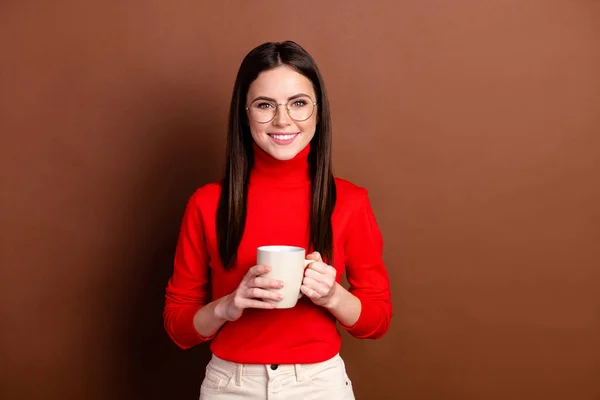 Photo of pretty positive person toothy smile hands hold coffee look camera isolated on brown color background — Stock Photo, Image