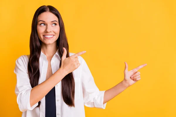 Portrait of adorable person look direct fingers empty space proposition isolated on yellow color background — Stock Photo, Image