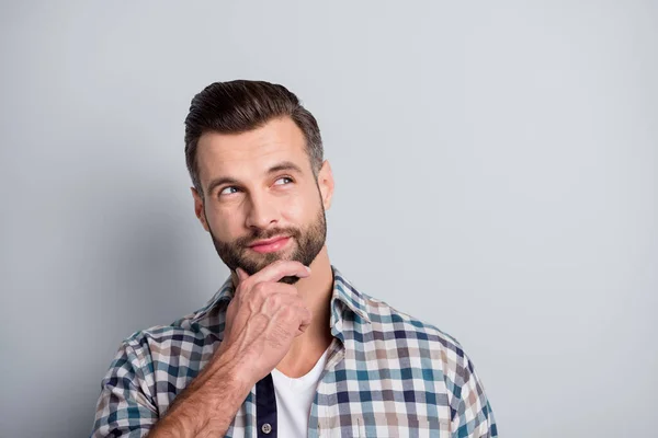 Photo of young handsome thoughtful positive smiling man look copyspace thinking isolated on grey color background — Stock Photo, Image