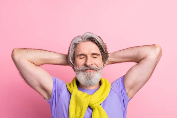 Close-up portrait of attractive dreamy cheery gray-haired man resting free time isolated over pink pastel color background — Stock Photo, Image