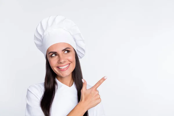 Portrait of charming cheerful person look interested direct finger empty space feedback isolated on white color background — Stock Photo, Image