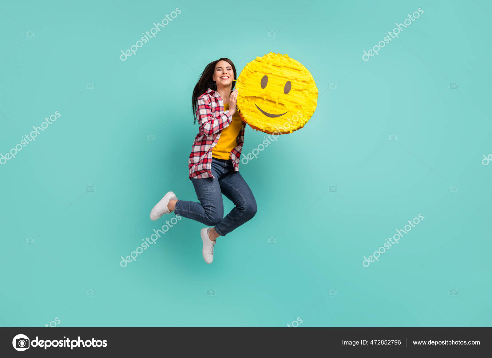 Full size profile side photo of funky happy woman jump up hold big paper emoji  smile isolated on teal color background — Stock Photo © deagreez1 #472852796, image size:1600x1167