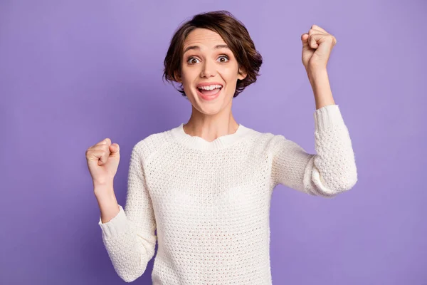 Portrait of astonished person fists up open mouth scream yeah won lottery isolated on purple color background — Stock Photo, Image